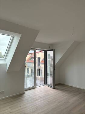 Wohnzimmer - Erstbezug: Moderne 2-Zimmer-Wohnung mit Balkon und Aufzug