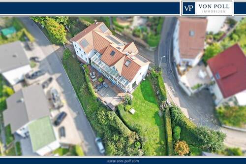 Titelbild - Stilvolles Zweifamilienhaus mit Outdoor-Oase in idyllischer Lage