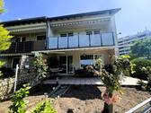 Haus_Rückansicht - Traumhafte Feldrandlage! Schönes Reihenendhaus mit Garage, Balkon, Terrasse und Keller (vermietet)