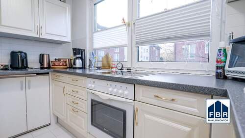 Küche mit Einbauküche - 