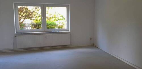 Wohnzimmer - 2 Zimmer Etagenwohnung in Husum