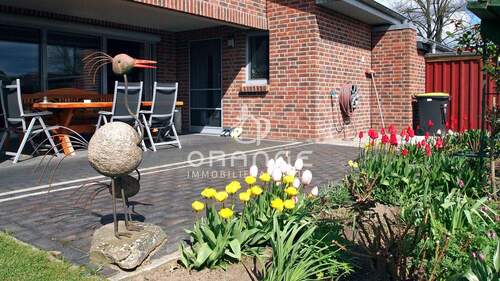 Terrasse mit Innen- und Außenbereich für schöne Grillabende bei jedem Wetter - 