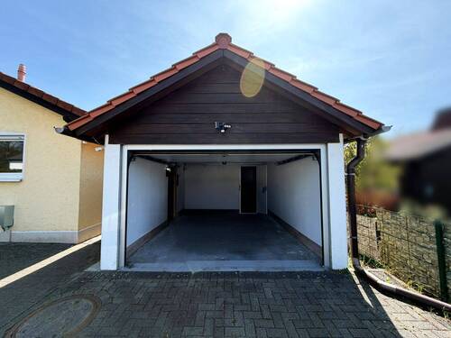 Garage - Einfamilienhaus mit 136,00 m&sup2; in Hamm (VG) zum Kaufen