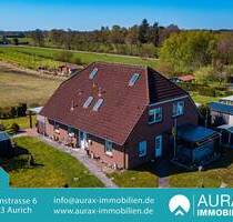 Solides Zweifamilienhaus mit Klinker und Krüppelwalmdach in ruhiger Lage von Großheide - 175 m² Wohnfläche, zwei Einheiten, großes Grundstück