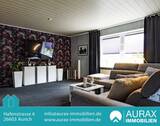 Wohnung im EG - Wohnzimmer - Mehrfamilienhaus, Wohnhaus in Großheide zum Kaufen