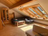 Wohnen - Gemütliche Dachgeschosswohnung mit Balkon, Gartenanteil und Garage in Habichsthal
