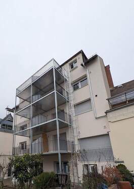 Außenansicht - Erstbezug! Stilvolle 2-Zi KfW Neubauwohnung in Toplage von Rüdesheim mit Küche, Balkon & Aufzug