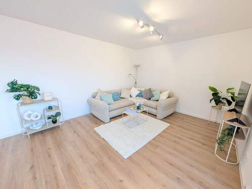 Wohnzimmer - Etagenwohnung mit 73,00 m&sup2; in Mutterstadt zum Kaufen