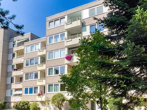 Frontansicht Mehrparteienhaus - Vermietete & gepflegte 2-Zimmer-Wohnung in Bulmke-Hüllen