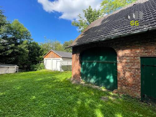 Gebäude und Garage - Einfamilienhaus mit 124,00 m&sup2; in Bad Essen zum Kaufen