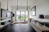 Wohnzimmer mit Blick auf die Spree - Living Levels - Architektur-Highlight mit Panoramablick auf die Spree