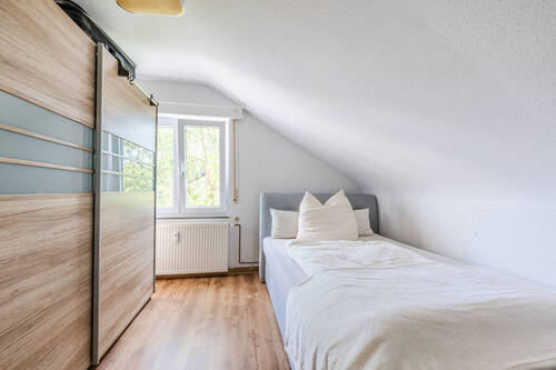 Schlafzimmer im Dachgeschoss - 