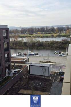 Balkonblick - Erstbezug! Charmante Dachwohnung mit erstklassiger Ausstattung an der Elbe!