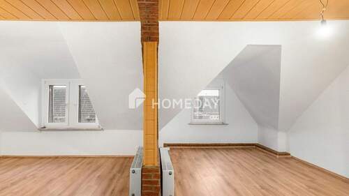 Wohnzimmer 2 - 3 Zimmer Etagenwohnung zum Kaufen in Duisburg