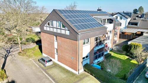 Seitenansicht - 2 Zimmer Mehrfamilienhaus, Wohnhaus in Pulheim