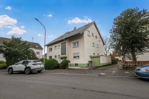 Frontansicht - Willkommen in Ihrem neuen Zuhause: Großzügige, lichtdurchflutete 3-Zimmer-Wohnung mit Balkon