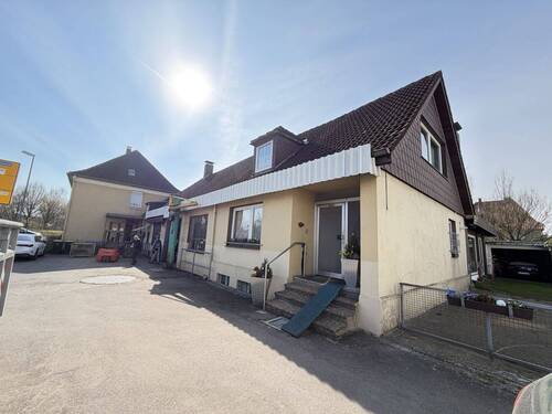 Seitenansicht - Mehrfamilienhaus, Wohnhaus zum Kaufen in Lage