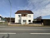 Straßenansicht - 9 Zimmer Einfamilienhaus zum Kaufen in Leopoldshöhe / Bexterhagen