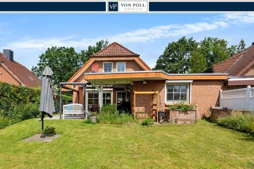 Titelbild - Einfamilienhaus mit Fasssauna in zentraler Lage von Lahausen
