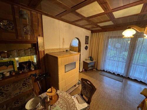 Wohnzimmer mit Kachelofen - 