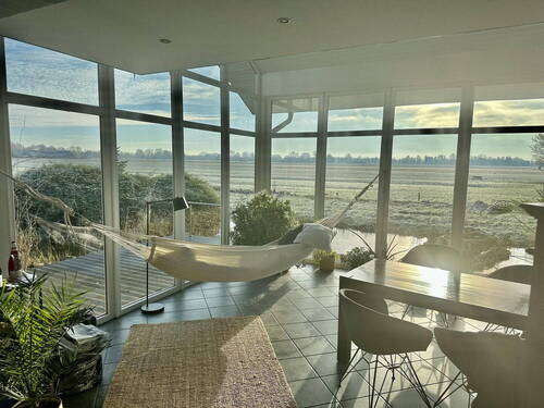 Wintergarten mit Hängemattenv. - 1 Zimmer Einfamilienhaus in Oberndorf