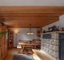 Wohnzimmer Kachelofen EG Haus 1 - 