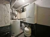 Gasheizung mit Warmwasserspeicher für EG-Wohnung - 