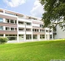 Großzügige 3-Zimmer-Wohnung mit Südwest-Loggia u. Schwimmbad in Gräfelfing-Lochham