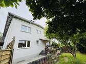 Bild 1 - Metzkausen: 4-Familien-Haus mit freier Eigentümerwohnung, 5 Stellplätzen und Garten !