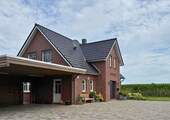 Referenzobjekt - Tradition trifft Moderne - Neubau Einfamileinhaus mit Friesengiebel in Ofenerdiek