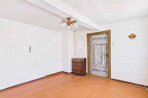 Wohnzimmer mit Ofen EG - 4 Zimmer Einfamilienhaus in Neuhaus-Schierschnitz