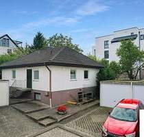 Ruhiger Bungalow mit großem Garten, vielseitigem Untergeschoss und drei Garagen in Bad Kreuznach