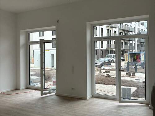 Wohnzimmer - Moderne 3-Zimmer Wohnung mit Terrasse, Garten und Stellplatz
