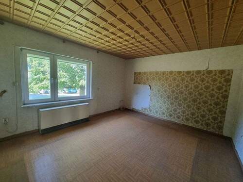 Wohnzimmer - Einfamilienhaus mit 101,70 m&sup2; in Hille zum Kaufen