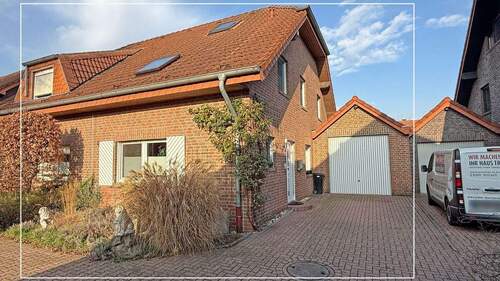 Außenansicht - Gepflegte Doppelhaushälfte mit idealer Raumaufteilung auf einem Erbbaurechtsgrundstück in Vluyn!