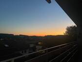 Weitblick vom Balkon mit Sonnenuntergang - 