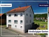 Titelbild - Gartenparadies mit Weitblick - großzügiges Zweifamilienhaus in Krottelbach