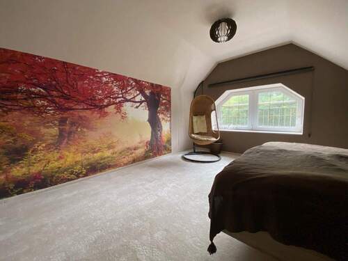 Schlafzimmer im Dachgeschoss - 