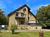 Bild1 - Exklusives Einfamilienhaus mit Einliegerwohnung und außergewöhnlichem Grundstück