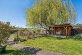 Garten mit überdachter Terrasse - 
