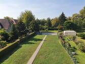 Garten und Stellplatz - Frisch renovierte 2 Zimmerwohnung mit Einbauküche, Badewanne und Gemeinschaftsgarten!