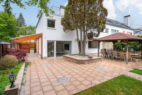 Aussenansicht - Aigner - Seltene Gelegenheit: Reiheneckhaus mit modernem Anbau & grossem Garten in Taufkirchen