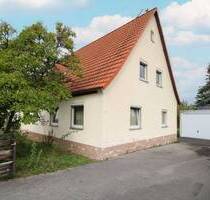 Viel Raum für Lebensträume - gestaltbares Einfamilienhaus mit großem Garten und Garagen in Eckental