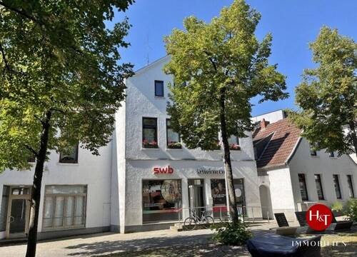 Haus mit Wohneinheiten und Gewerbe zu verkaufen Bremen Vegesack – H & T Immobilien - Vegesacker City - Wohn- und Geschäftshaus mit Parkplätzen und Garagen!