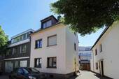 Hausansicht - Ideale Gelegenheit: Vermietete 2-Zimmer-Eigentumswohnung in DFH in Hürth - Efferen