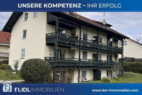 Bild 1 - 2 Zimmer Eigentumswohnung EG mit Balkon