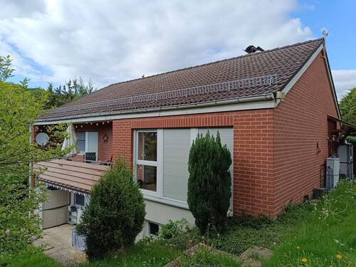 Rückansicht - Einfamilienhaus mit Einliegerwohnung in Niestetal zu verkaufen!