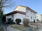 seitliche Front mit Anbau - 8 Zimmer Mehrfamilienhaus, Wohnhaus zum Kaufen in Bünde