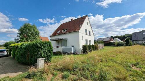 Straßenansicht - 5 Zimmer Mehrfamilienhaus, Wohnhaus zum Kaufen in Bünde / Hüffen