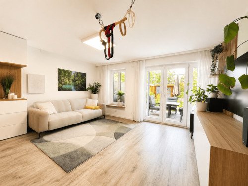 Helles Wohnzimmer - Reihenmittelhaus mit 86,00 m&sup2; in Dachau zum Kaufen